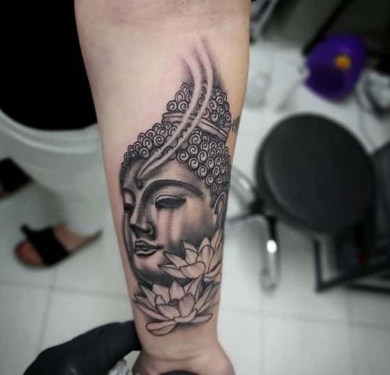 buddha with lotus tattoos