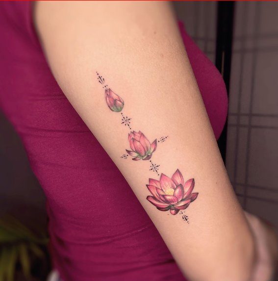 lotus tattoo design on upper arm