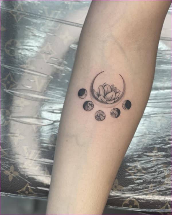 lotus tattoo on forearm