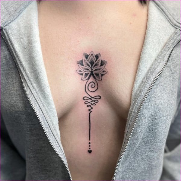 lotus tattoo between breast