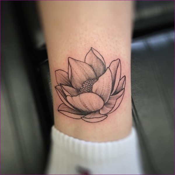 lotus tattoo on legs