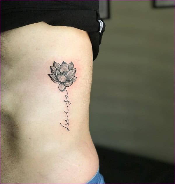 lotus tattoo rib cage