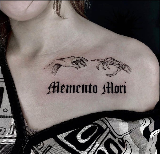 women's memento mori tattoo 
