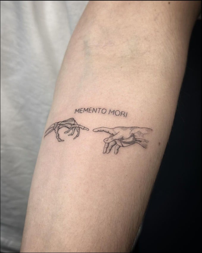 memento mori tattoo hand