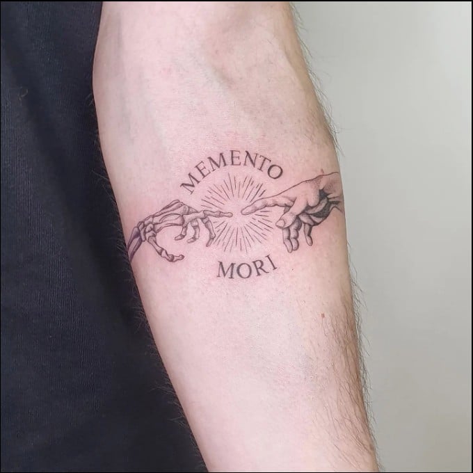 women's memento mori tattoo 
