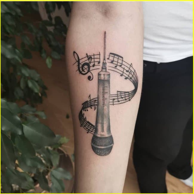 musical sheet notes tattoos