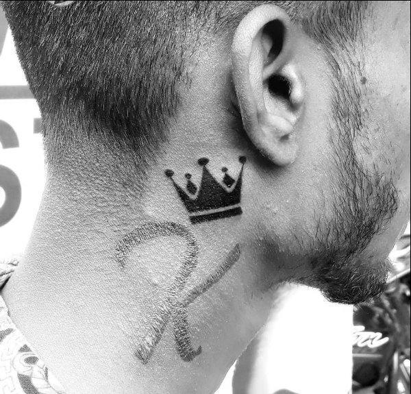 7: A crown neck tattoo design for neck. 