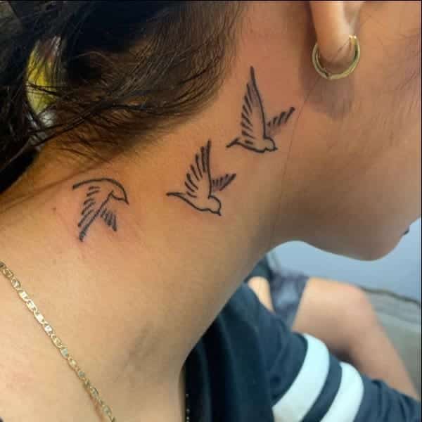 birds neck tattoos