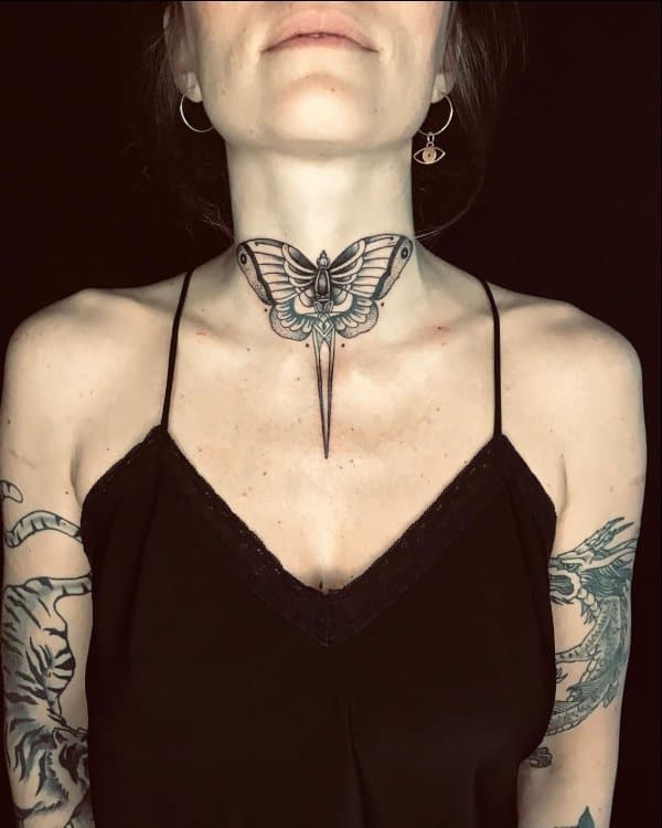 Butterfly neck tattoo with sword