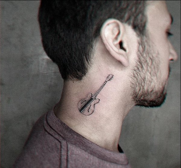 guitar neck tattoos.