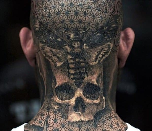 butterfly with skull tattoo on neck