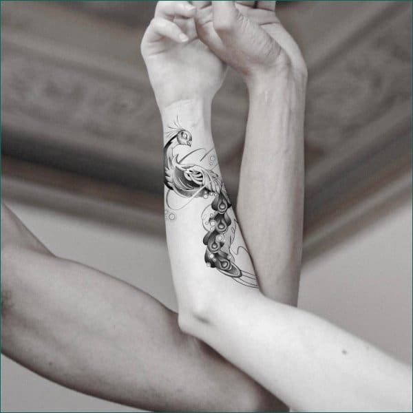 matching peacock tattoos for couples