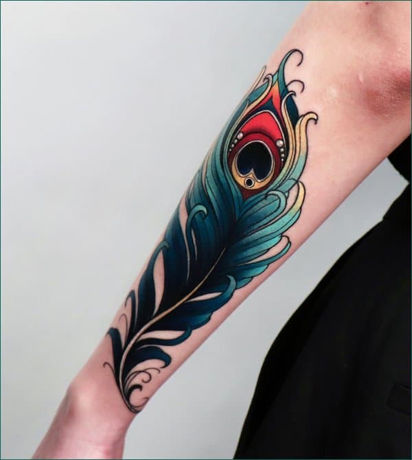 Om  Flute on Peacock Feather Tattoo  Ace Tattoo