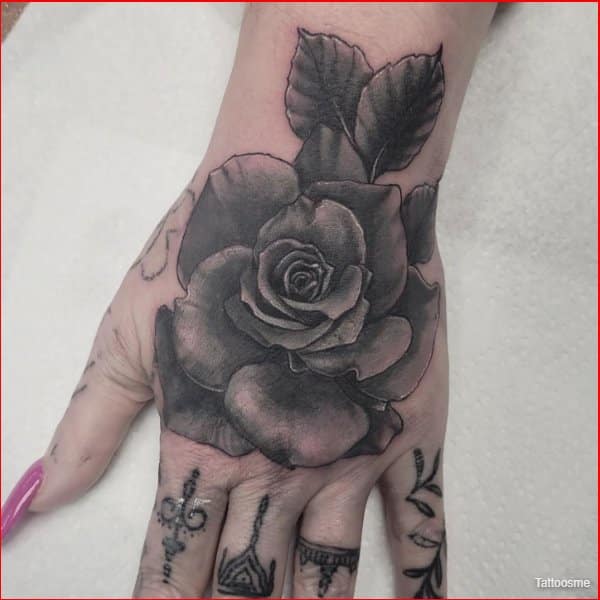 rose tattoo on hands
