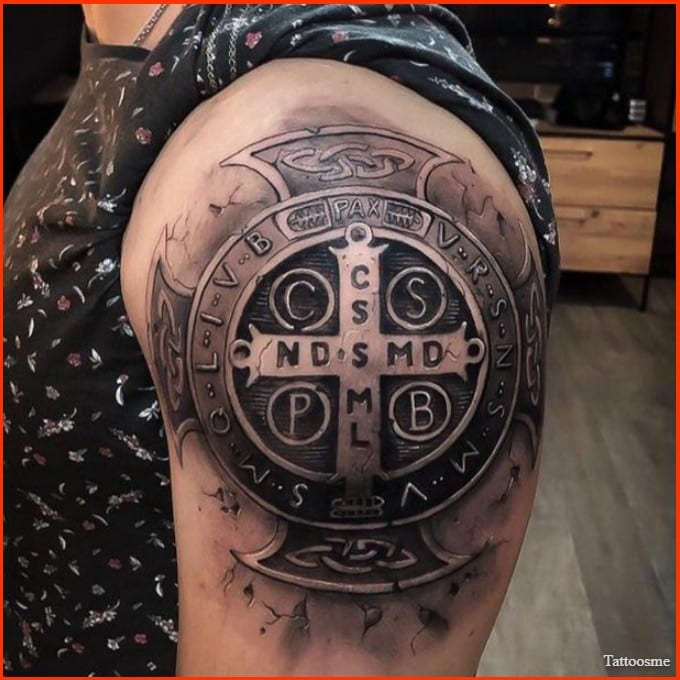 Celtic cross tattoo on shoulder for men