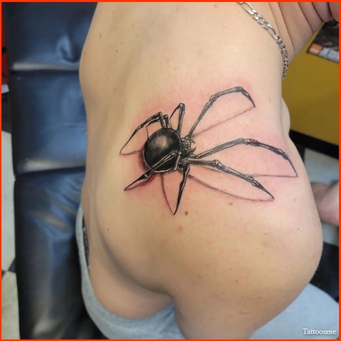 black widow tattoo on shoulder