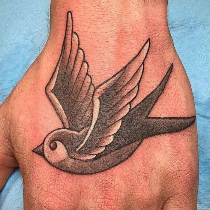 sparrow tattoo on hand