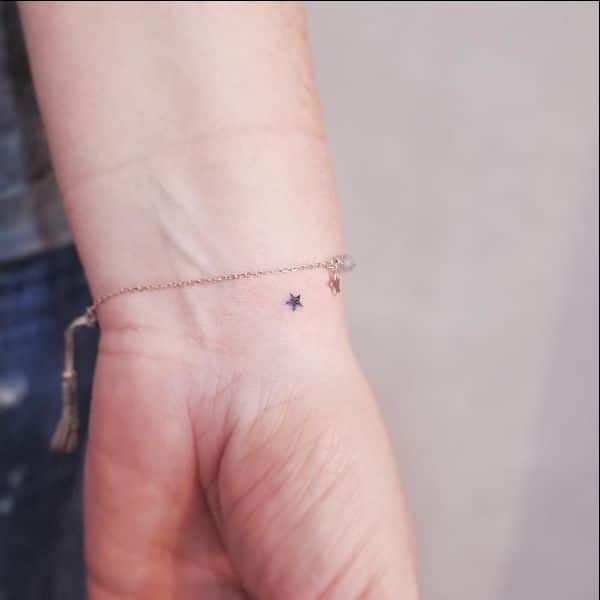 star tattoo on wrist