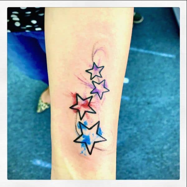 star tattoos on arms