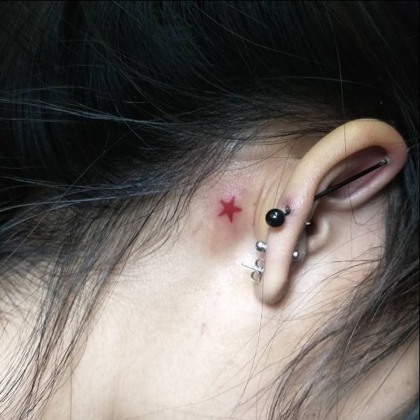 star tattoos behind ears