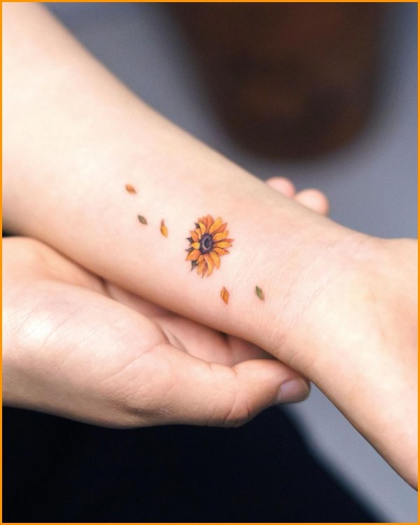 small wrist sunflower tattoos