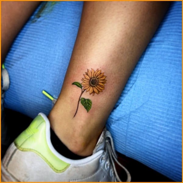 best sunflower tattoos for legs