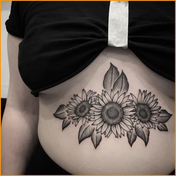 sunflower tattoo under boob