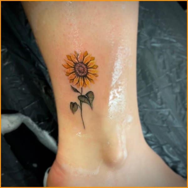 sunflower tattoo legs