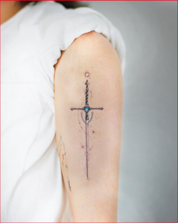 sword tattoos on arm