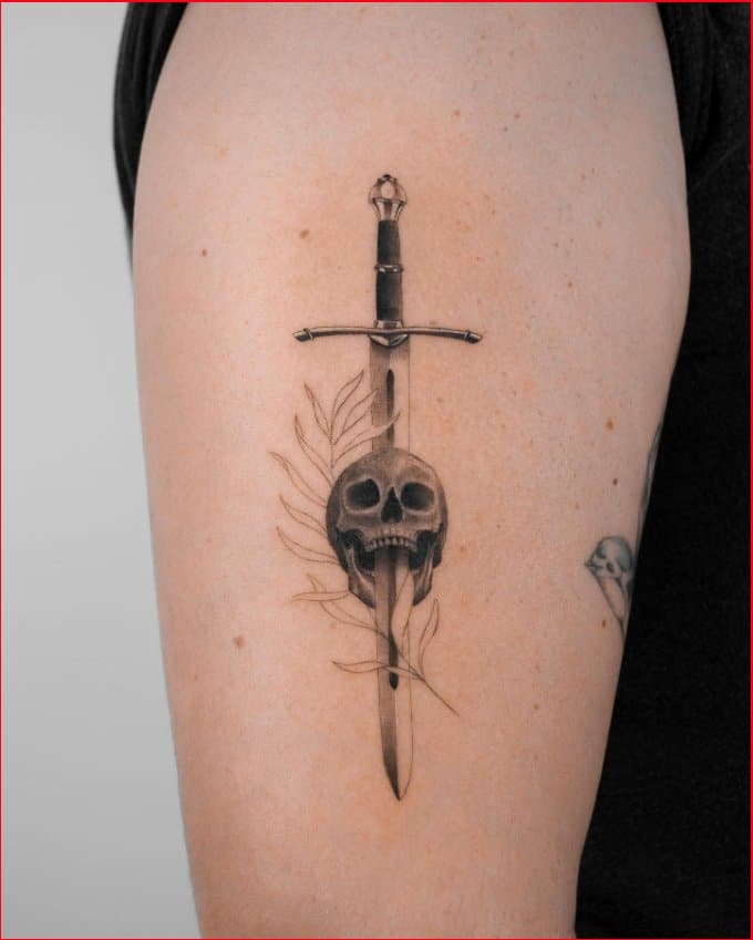 skull and swords tattoo