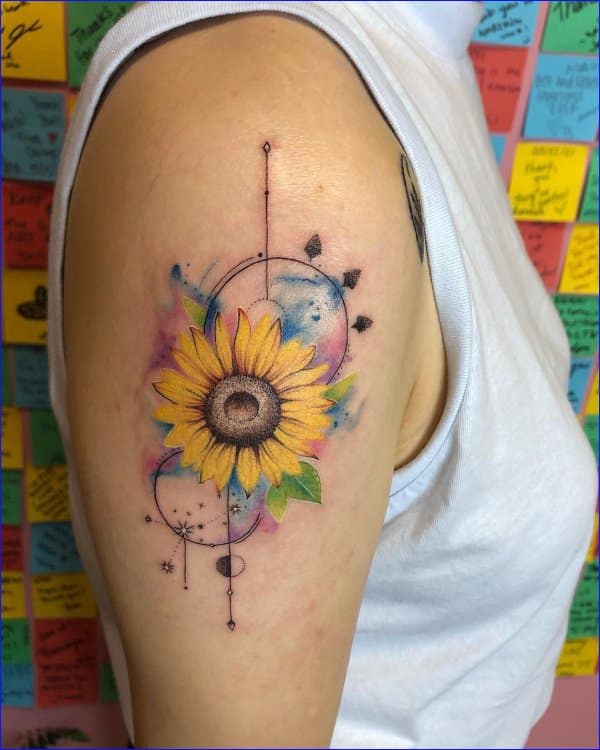 Watercolor sunflower tattoo on the forearm