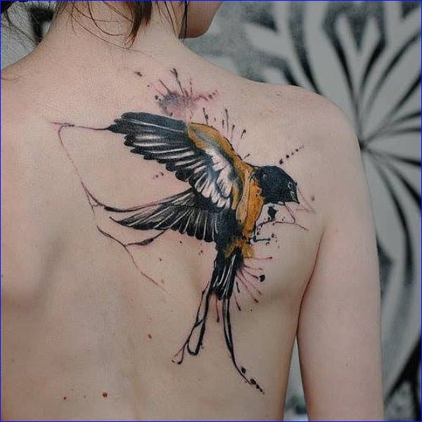 watercolor sparrow back tattoos