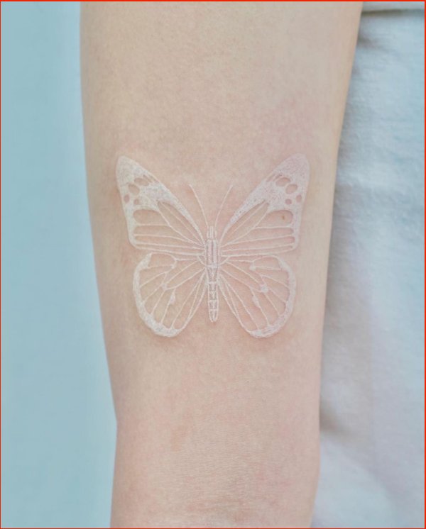 white ink butterfly tattoo