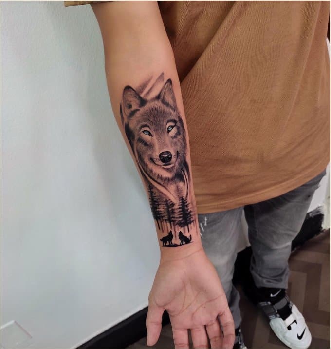 wolf tattoo on forearm