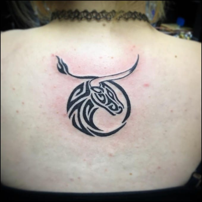 tribal taurus sign tattoo