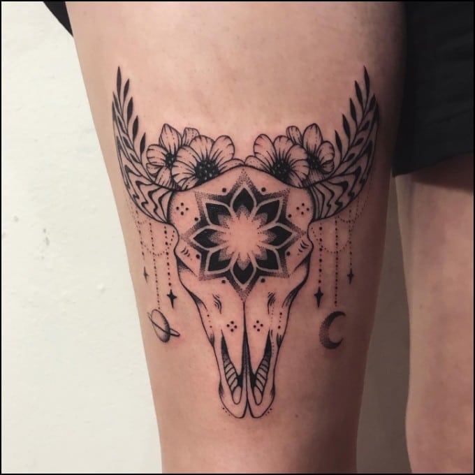 taurus skull tattoo with flowers