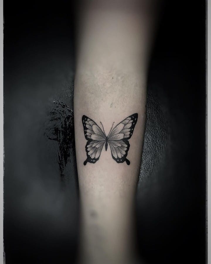 Butterfly hand tattoo