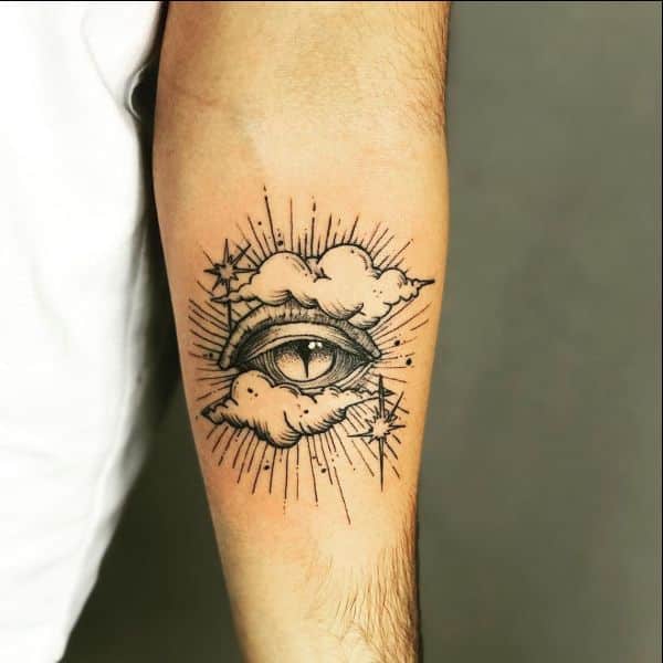 eye cloud tattoo forearm