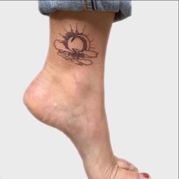 cloud tattoo on leg
