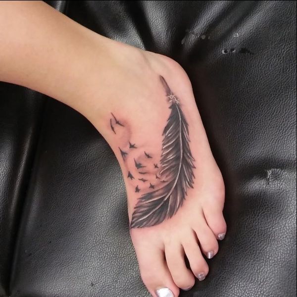 feather with bird tattoos