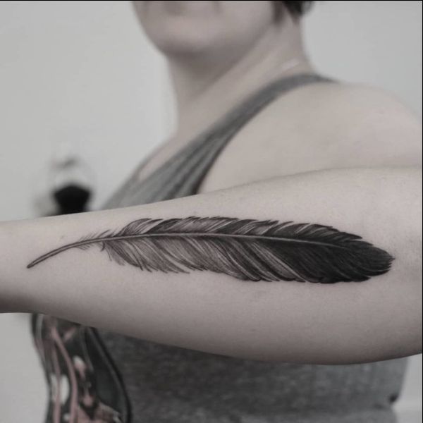 feather tattoos on hand