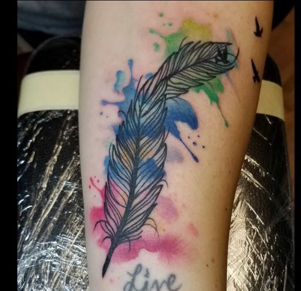 feminine feather tattoos