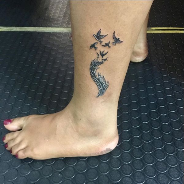 feather leg tattoos