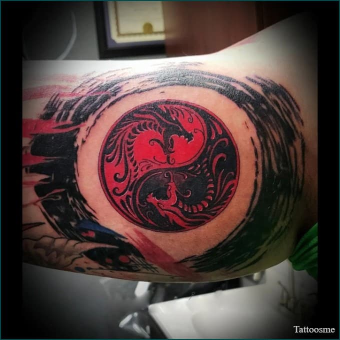 Mortal combat style yin yang tattoo on inner bicep
