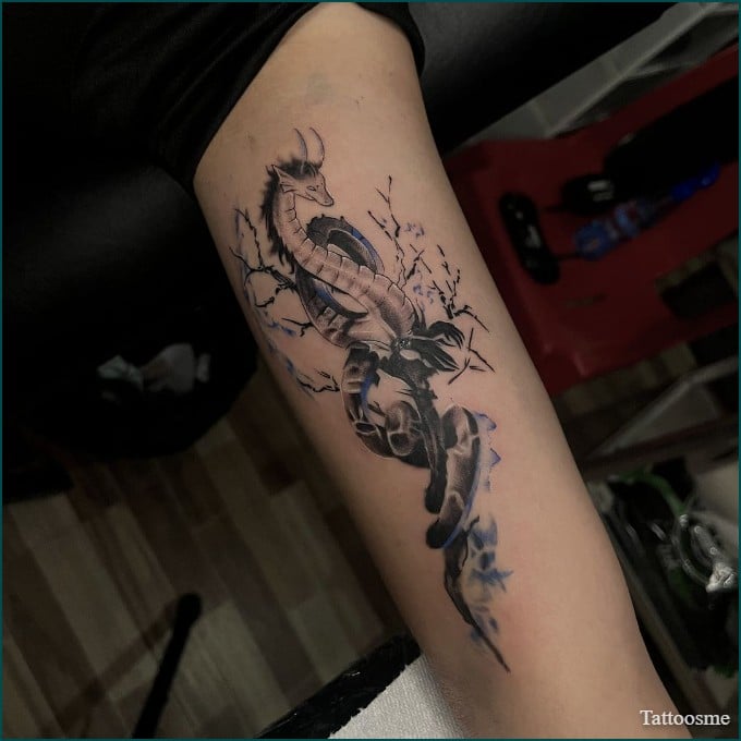 dragon inner bicep tattoo