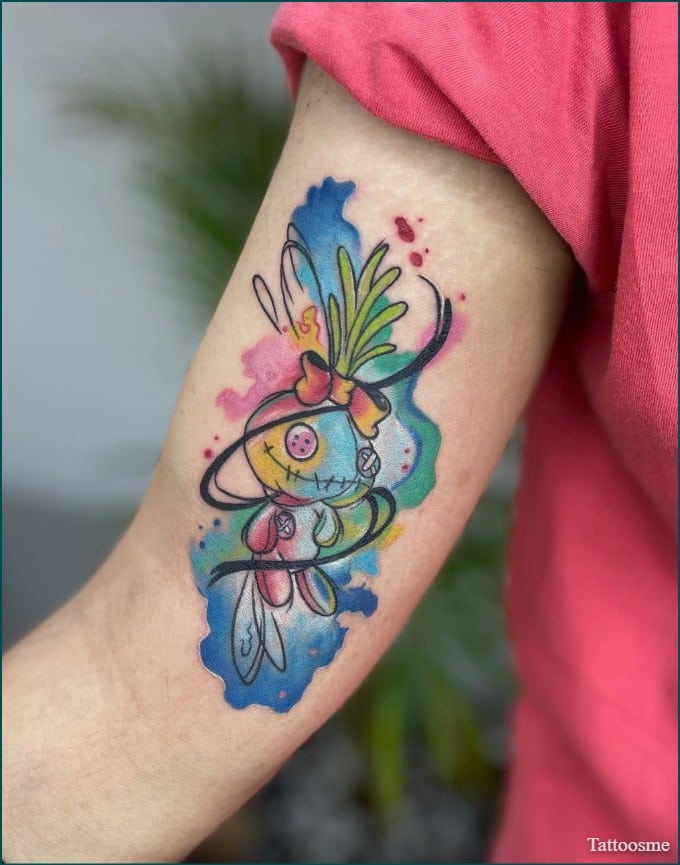 watercolor inner bicep tattoo