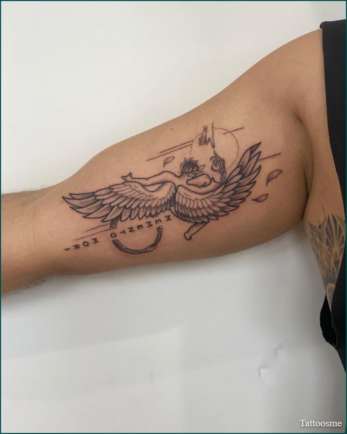 angel wing inner bicep tattoo