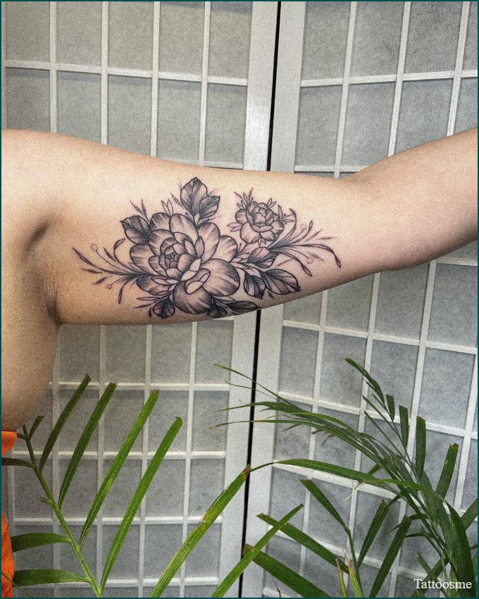 inner bicep flower tattoo