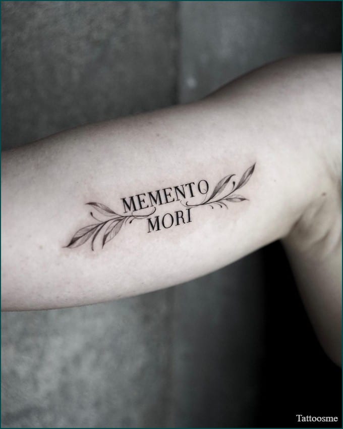 memento mori inner bicep tattoo