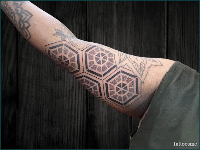 geometric tattoo design for inner bicep